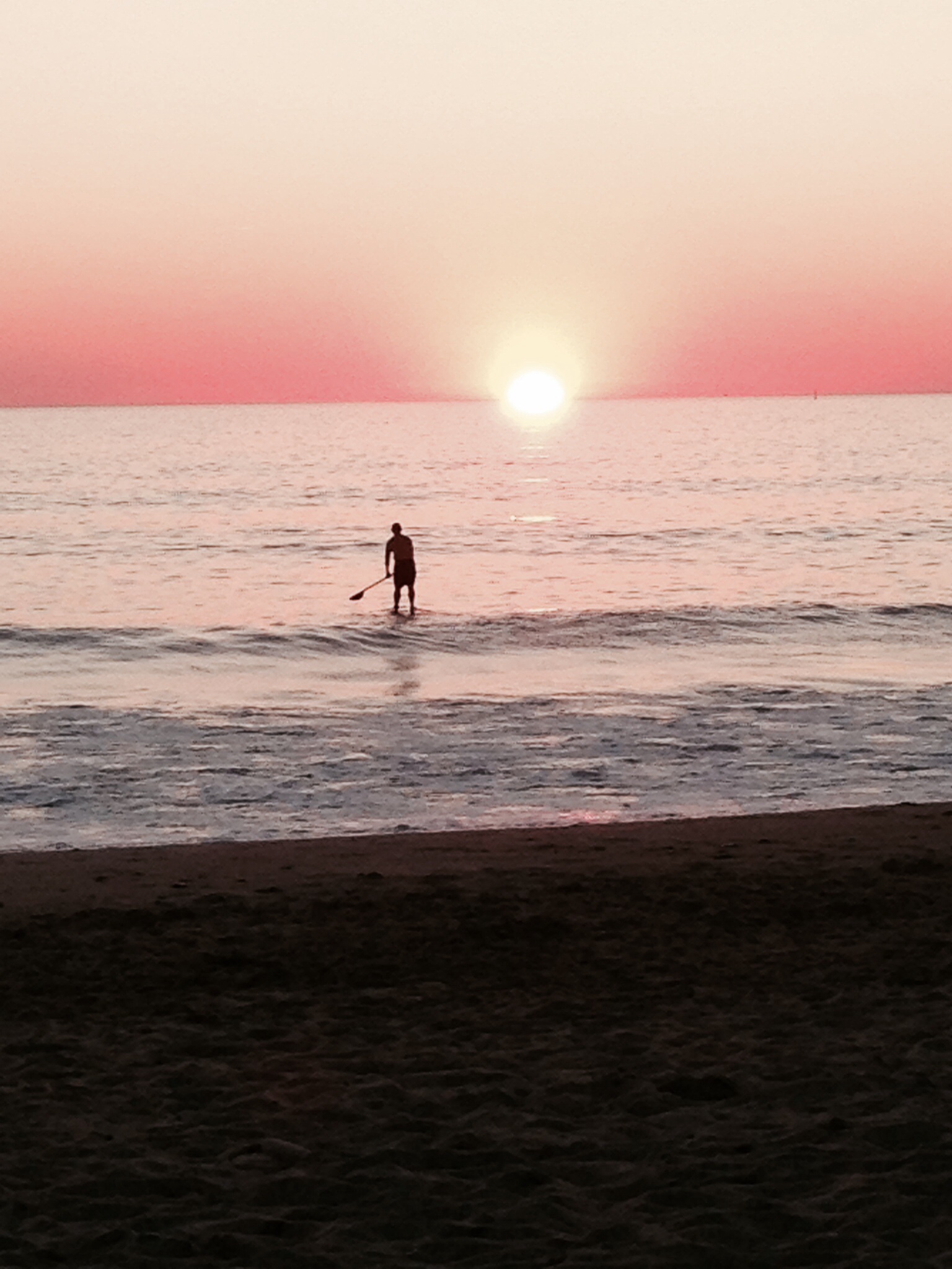 Sunset with a paddle boarder 